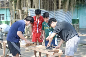 Sekolah Victory Plus students built volleyball field in Giripurwo village drig the CAS project.