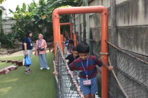 Parents and children are exploring Sekolah Victory Plus, an international school in Indonesia, during the open consultation week.