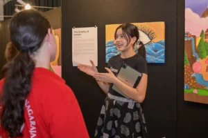 One of the students of Sekolah Victory Plus, an international school in Bekasi, presented her artwork during the IB DP Visual Art Exhibition.